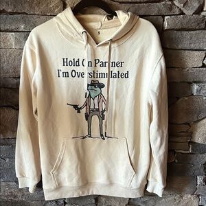 Graphic Hoodie “Hold on Partner I’m Overstimulated” with cowboy frog unisex sml